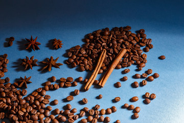 Coffee beans with cinnamon and stars