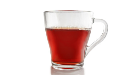 Glass cup of tea on a white background.