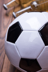 Fototapeta na wymiar Closeup of soccer ball and fresh beer. Beer Football