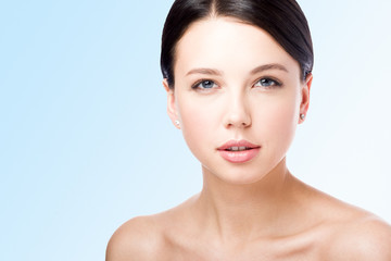 Fototapeta premium Сloseup beauty portrait. The face of a beautiful young woman