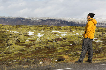 guy is on the road in Iceland