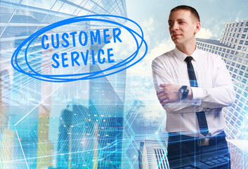 The concept of business, technology, the Internet and the network. Young businessman showing inscription: Customer service