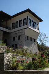 Fototapeta na wymiar Traditional ottoman houses in old town Berat known as the White City of Albania 