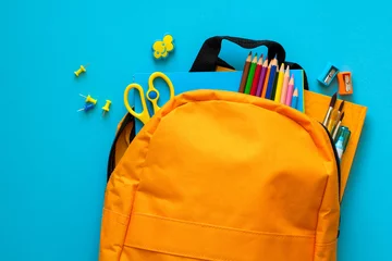 Door stickers School Back to school concept. Backpack with school supplies. Top view. Copy space