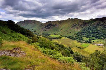 Fototapeta premium Dark clouds over the Patterdale common