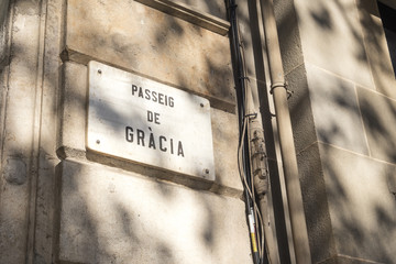 Detail of street sign of Passeig de Gracia (Gracia's Avenue) in Barcelona, Spain