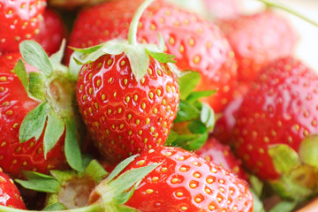 Fresh ripe strawberry background. Red organic fruits close up