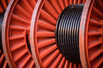 Large wires on giant wheels.