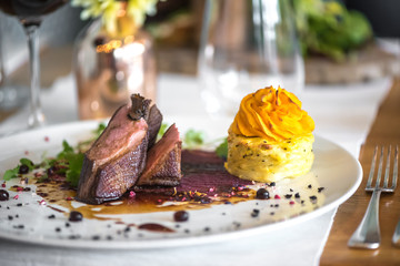 Roast duck breast with potato dumplings