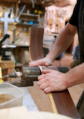 Shape shaping from rosewood for sides of classical guitar.