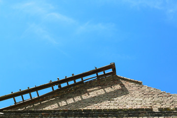 Fototapeta na wymiar old castle roof and sky