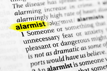 Highlighted English word "alarmist" and its definition in the dictionary
