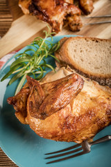 Pieces of roast chicken.