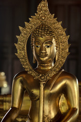 Golden Buddha images in different attitudes sculpture at Wat Krathum Suea Pla temple ,Bangkok