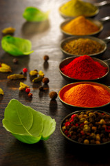 Wooden table of colorful spices