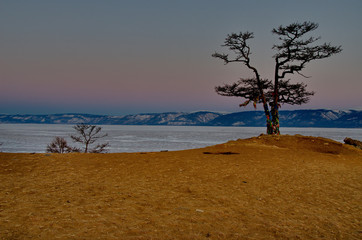 Russia. The Lake Baikal. Dawn on Cape Burhan of Olkhon island.