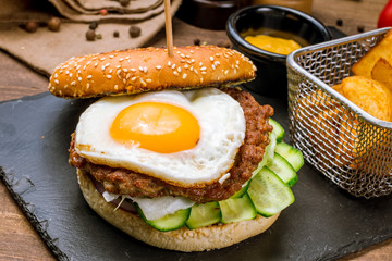 Burger with egg and beef