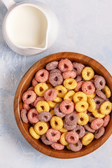 Colorful cereal rings in bowl.