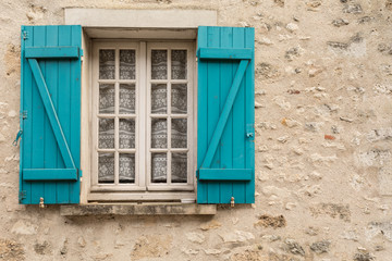 old window with shutters
