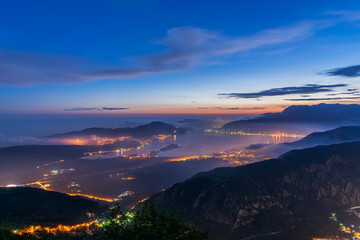View of Kotor Bay from a high mountain peak at sunset.