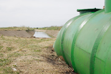 Irrigation artificial channel flooded with water in the planes of eastern Romania
