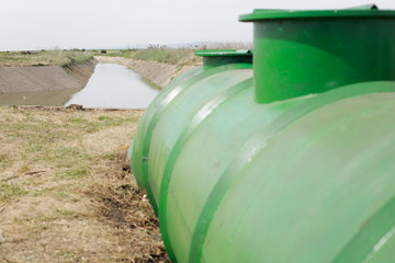 Irrigation artificial channel flooded with water in the planes of eastern Romania