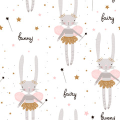 Seamless pattern with cute bunny ballerina with wings, stars, magic wand . Creative childish background. Perfect for kids apparel,fabric, textile, nursery decoration,wrapping paper.Vector Illustration © solodkayamari