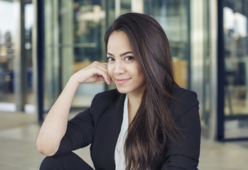 Portrait of attractive hispanic business woman
