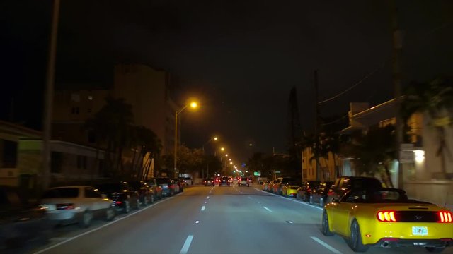 Motion footage yellow Ford Mustang driving on road