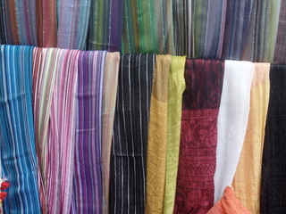 Colourful scarves for sale outside a shop in Essaouira, Morocco