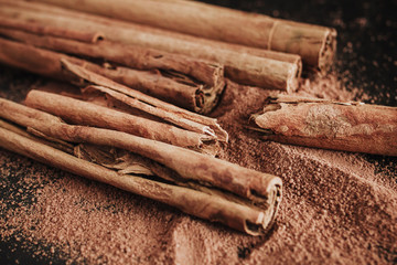 cinnamon sticks, on wooden in rustic style
