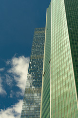 skyscraper close-up against the sky and clouds