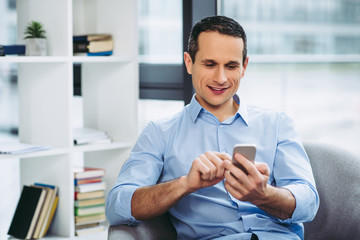 businessman texting message on the smartphone