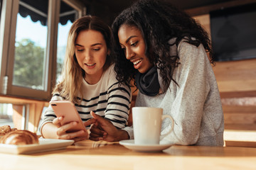 Friends sitting in a cafe