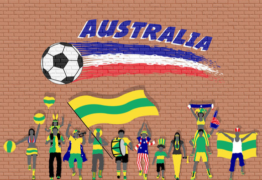 Australian football fans cheering with Australia flag colors in front of soccer ball graffiti
