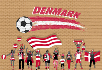 Danish football fans cheering with Denmark flag colors in front of soccer ball graffiti