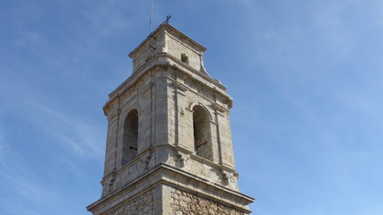 Fototapeta na wymiar Bell tower with blue sky