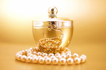 gold jewelry box gold background and pearls
