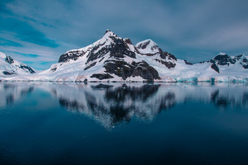 Fototapeta na wymiar Panoramic view of glaciers and icebergs in Paradise Harbor, Antarctica