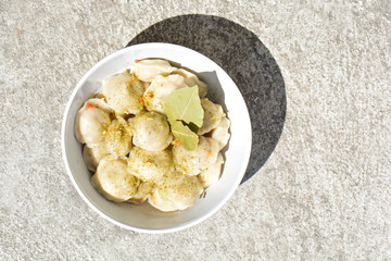 Meat dumplings with spices. Russian classic dumplings. Traditional Russian food