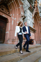 Fototapeta na wymiar fashion portrait of beautiful young couple posing outdoors