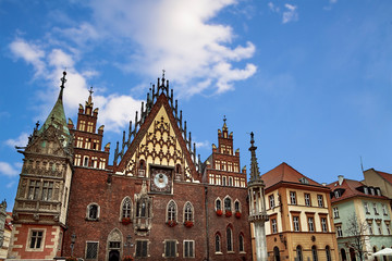 Fototapeta na wymiar Wroclaw Town Hall at Market Square against bright summer sky. Historical capital of Silesia Poland, Europe. Travel vacation concept