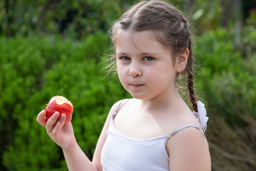 a  girl with an apple