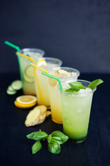 Lemonade with four different tastes on the black background