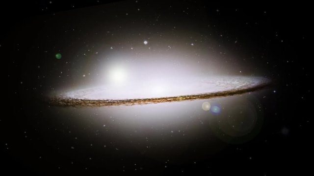 Sombrero galaxy Messier 104 slow rotating with flying stars and light in outer space, 3D animation. Contains public domain image by NASA
