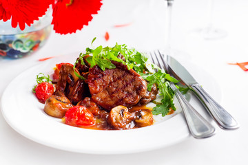 Fototapeta premium Juicy steak medium rare beef with spices and grilled vegetables.