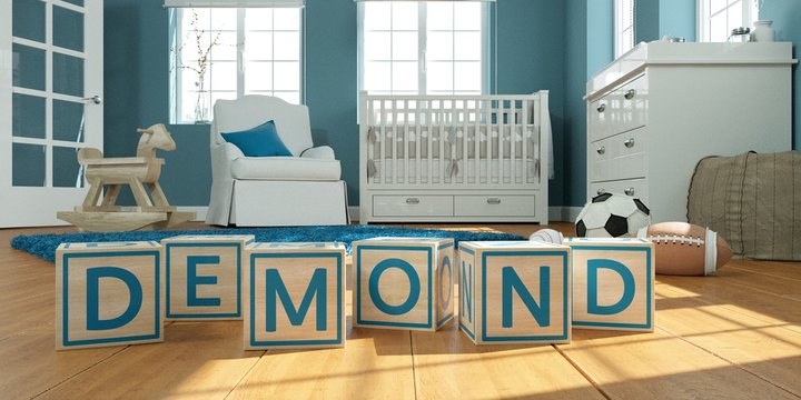 The name demond written with wooden toy cubes in children's room
