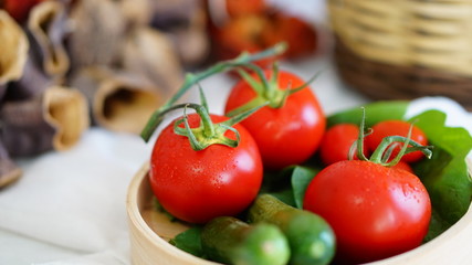 fresh organic vegetable. Tomatoes, cherry tomatoes, cucumber with white background