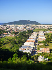A view of Ingleses do Rio Vermelho district from above - Morro das Aranhas (Spider's Hill) in the background (Florianopolis, Brazil)