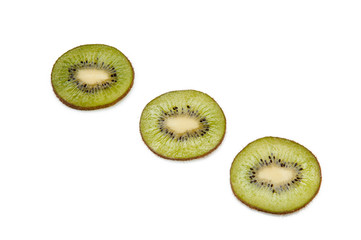 sweet ripe kiwi fruits on white, Kiwi cut into slices lay on a yellow plate, serving fruit
